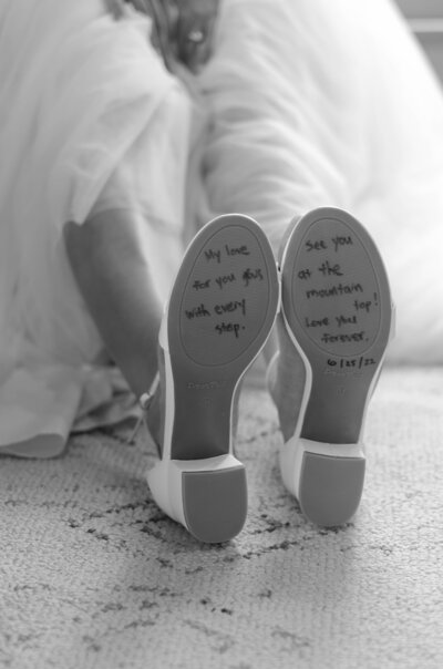 bridal wedding shoes with handwriting on the soles