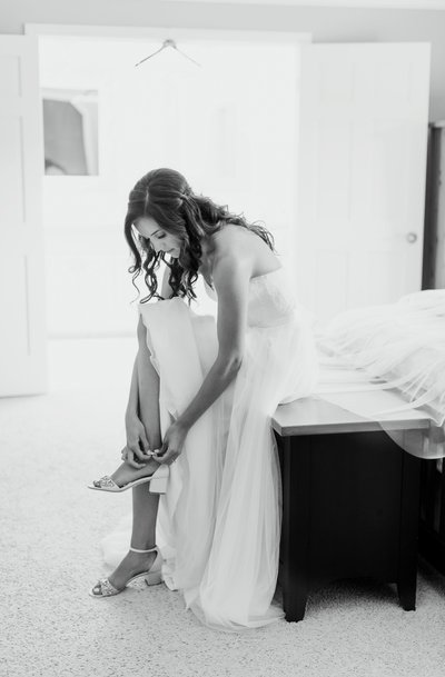 Wedding Photography, bride getting ready and putting on her heels