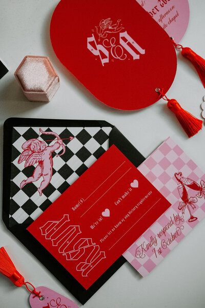 Pink and Red Vegas Wedding Stationery. 