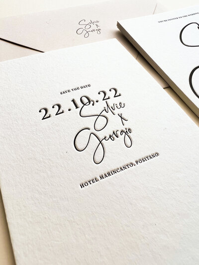Sylvie oversized lettering letterpress wedding save the date card close up