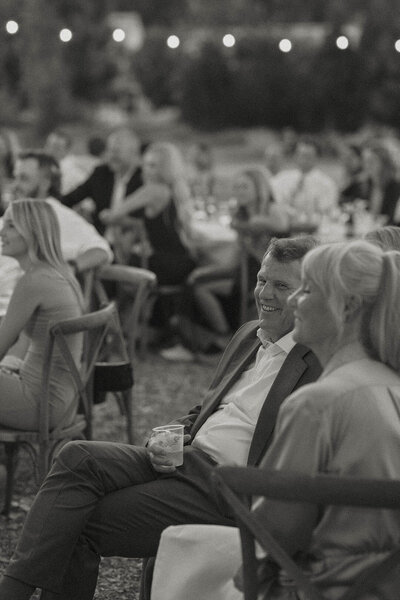 candid of family laughing at a wedding reception in lake tahoe