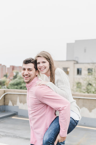 Bride on grooms back engagement photo pose ideas