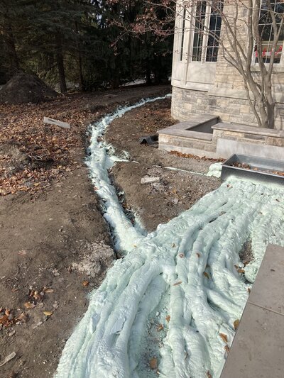 Insulation surrounding outdoor pipes of walkway