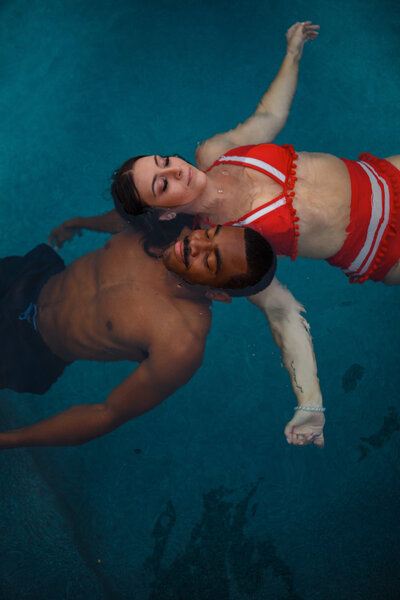 couples photos floating in the pool