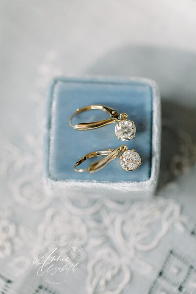 Photo of earrings on top of velvet