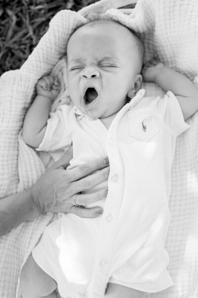 Baby yawning by Miami Family Photographer