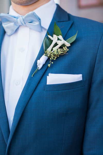 Wedding Photographer, close up of groom's suit pocket