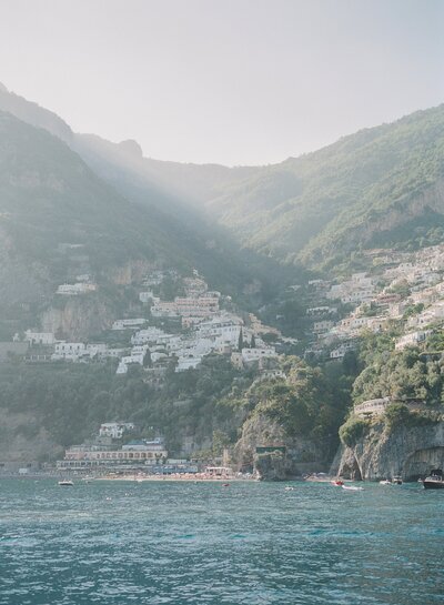 sunset in positano italy cliff water blue travel photo