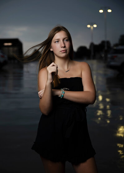 Senior portrait of a girl  at the Marriot parking ramp on the bayfront in downtown Erie Pa