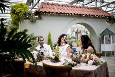 Models sitting together at the tablescape
