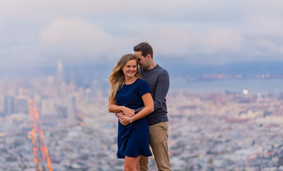 A Vancouver sunset engagement photo by the Vancouver Convention Centre