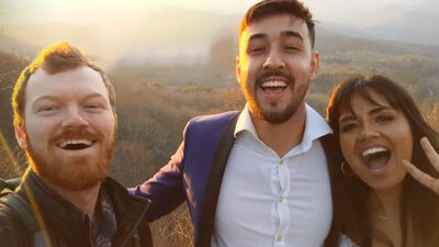 Couple takes a selfie with their elopement photographer