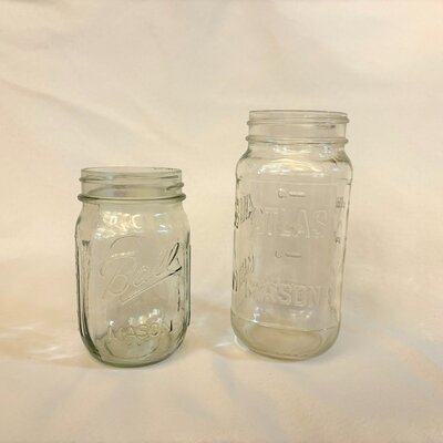 decor table glasses and vases at barnwood events in madison, winconsin.