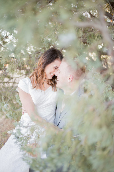 Seattle Wedding Photographer captures couple hugging during outdoor portraits