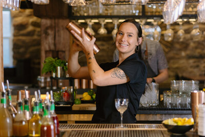 A bartender shakes a drink at the Windsor Mill Tavern in Windsor, Colorado.