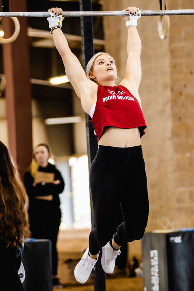 Trainer looking left to the middle distance