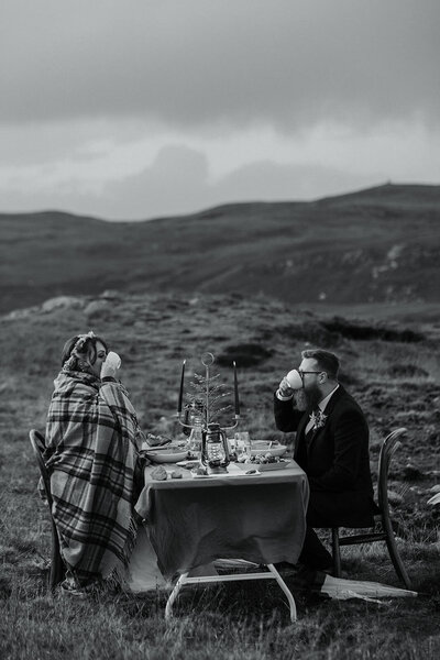 Bride and groom picnic after eloping in Scotland