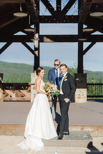 bride and groom looking at guests during ceremony at swiftwater cellars