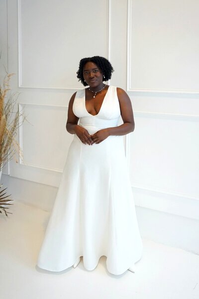 Link to more photos and details about the Sol modified a-line wedding dress style.