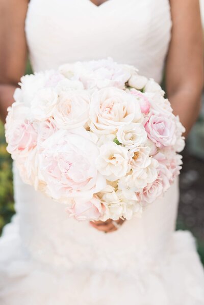 Light pink cream and white wedding bouquet of roses
