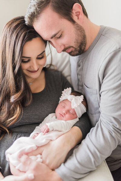 In-home lifestyle Newborn Photo session, sibling love, taken in Mission Viejo, California