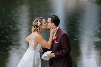 couples kissing at their lake tahoe wedding