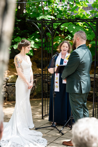 couple reading vows on their wedding day by atlanta wedding photographers