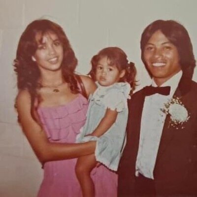 Lynnette with her mom and dad when she was little