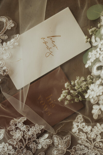 The bride and Groom wrote their voews in these beautiful books and we photographed them underneath the brides veil