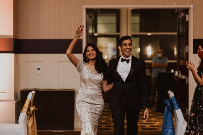 Kansas City Wedding Photographer, traditional Indian wedding bride and groom entering reception