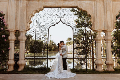 couple under moroccan arch