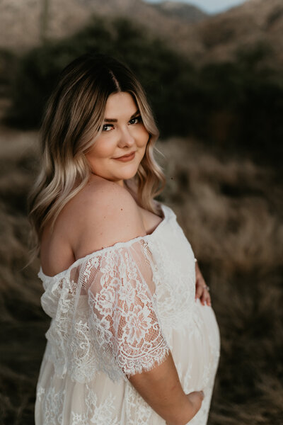 maternity mama in white lace maxi dress for oro valley family