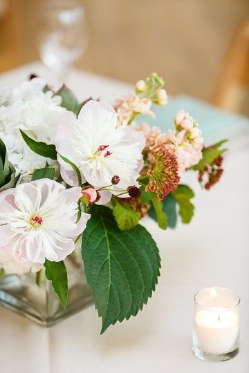 Spring wedding centerpieces with locally grown peonies.  Photo by Greenhouse Loft Photography.