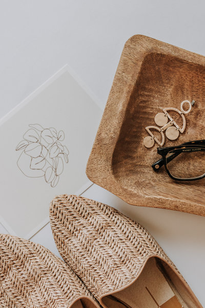 line drawing with shoes and earrings