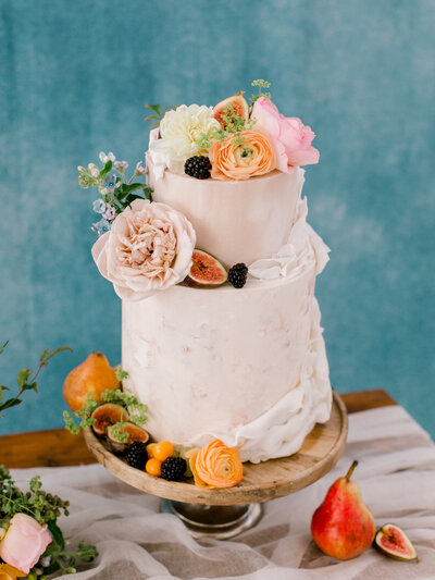 natural wedding cake with flowers and fruit