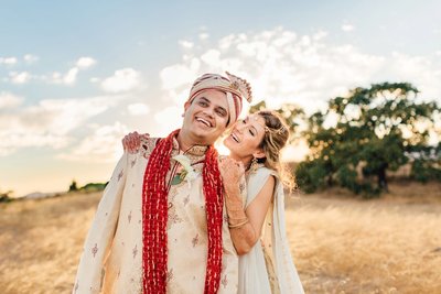 Wedding Photography, bride and groom in a field