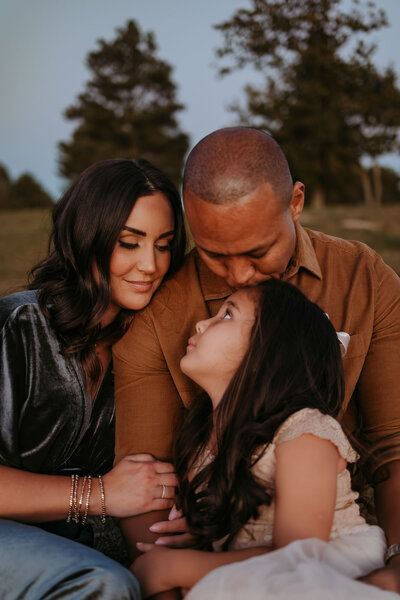parents and kids hugging in a family photo