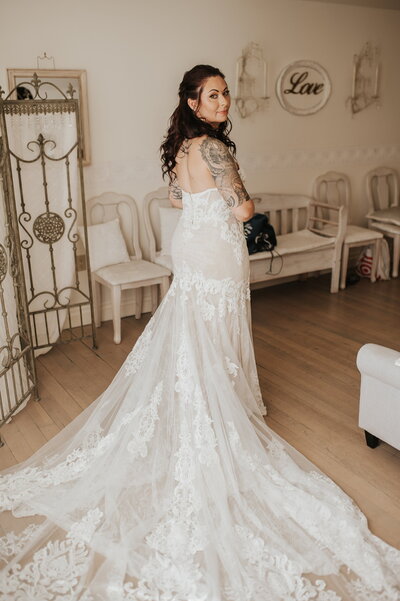 Bride standing in bridal suite