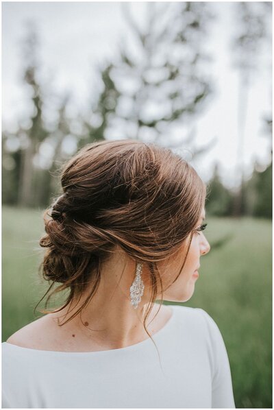 Bride with beautiful earrings and hair in Knoxville Tennessee