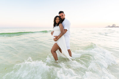 Whitney Sims Photography specializes in wedding, engagement, and family photography. She services Navarre Beach, Destin, and surrounding areas along Florida's gulf coast.