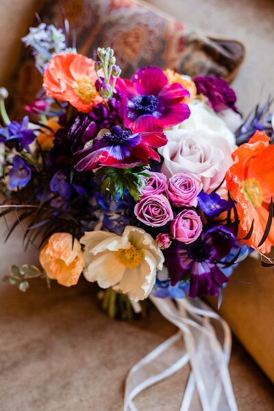 Purple pink and orange wedding bouquet