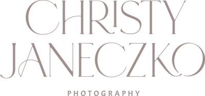Text based logo with words "Christy Janeczko" in a serifed font and the words "photography" in a simple sans serif font.