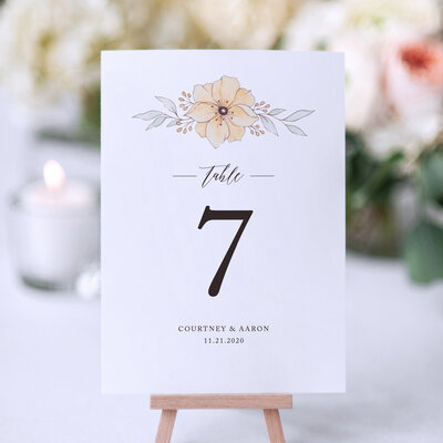 table number design with orange florals