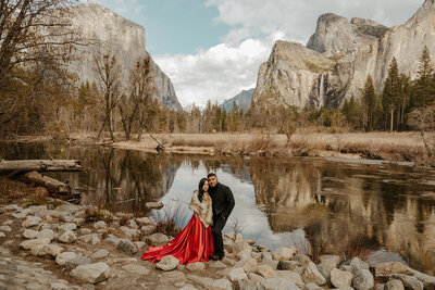 bride and groom smiling at the camera at their elopement at valley view in  yosemite