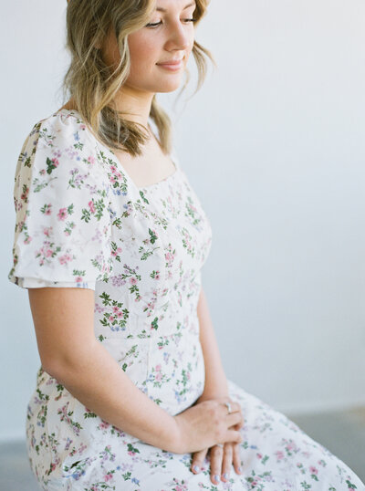 Branding photography featuring women wearing floral top.