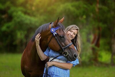 photo of bella taylor the photographer with her horse