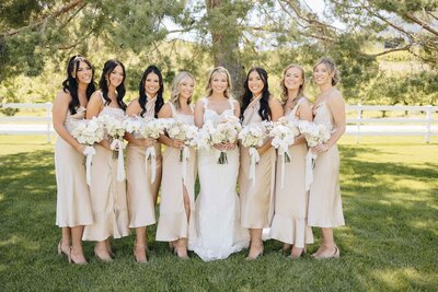 Bride & Bridal Party with Bouquets - Mikayla & Mario | Harmony Meadows Wedding - Lake Chelan Wedding