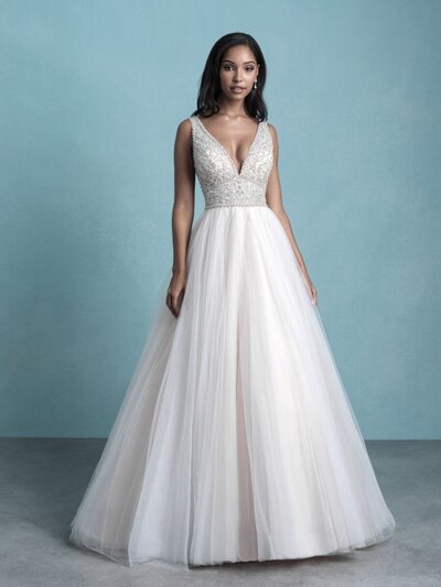 Rich, ornate beadwork tops the bodice of this tulle gown.