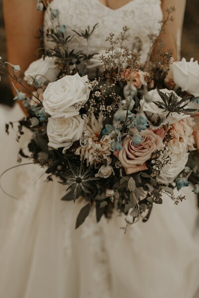 Close up of a bouquet being held by a bride.