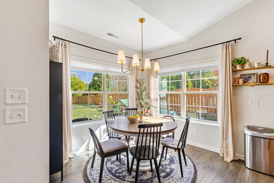 Updated light fixture and beautiful oversized windows